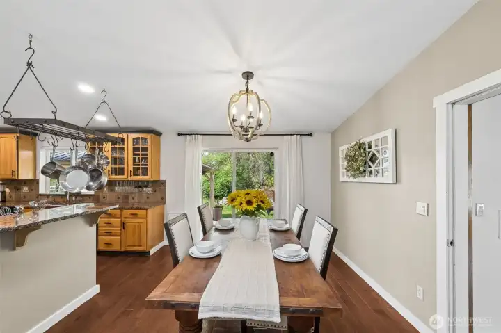 Dining Area with slider to back and door to MIL