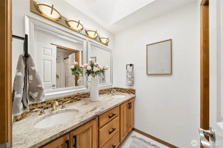 Main hallway bath with dual sinks