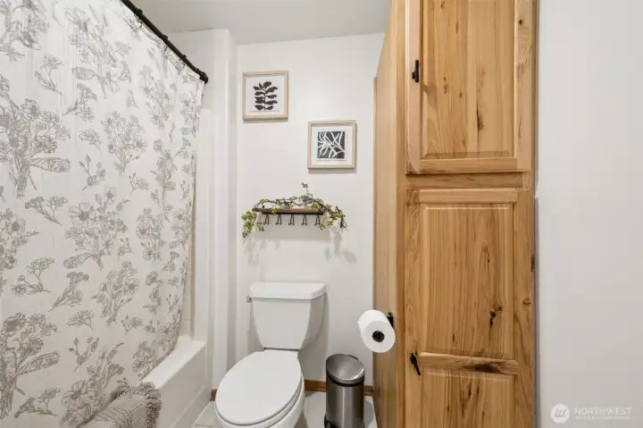 Separate shower/tub/comode area