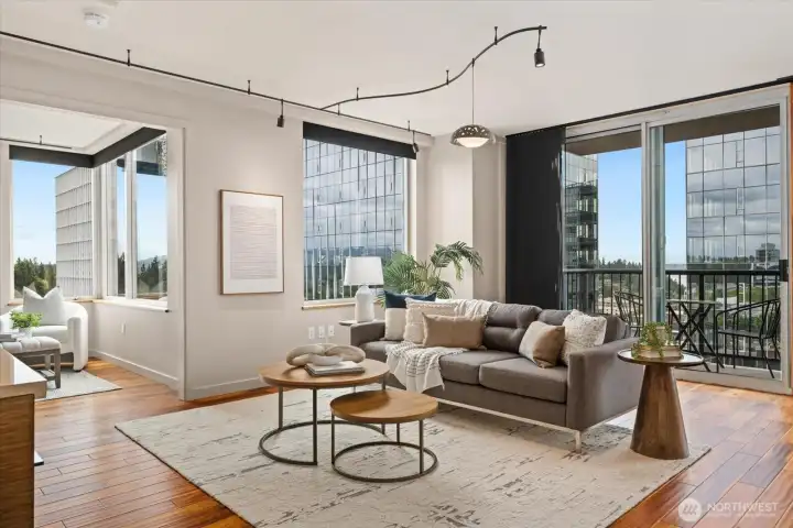 A welcoming space that is filled with natural light. A small deck is the perfect spot for a coffee or a cocktail.