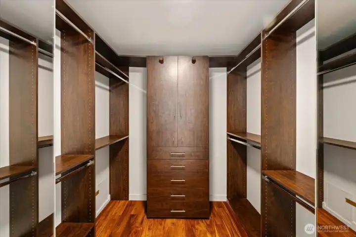 A well designed primary closet is ready for your stylish accessories.  Don't miss the adjacent smaller walk-in too.