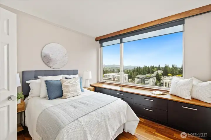 Your secondary bedroom has a beautiful view of Mount Rainier and a great built in storage space below the window.