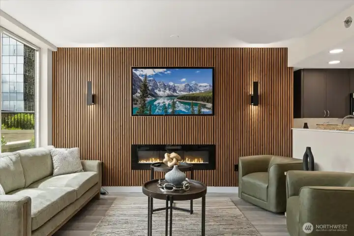 Relaxing by the fireplace with friends in the Garden Room makes the space comfortable and cozy.