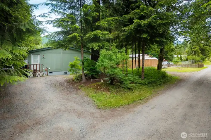 Ample parking with circular driveway.