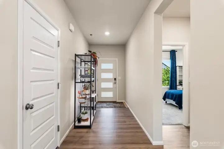 Beaming natural light now flows through the entry way! Main floor bedroom to the right (left on entry).
