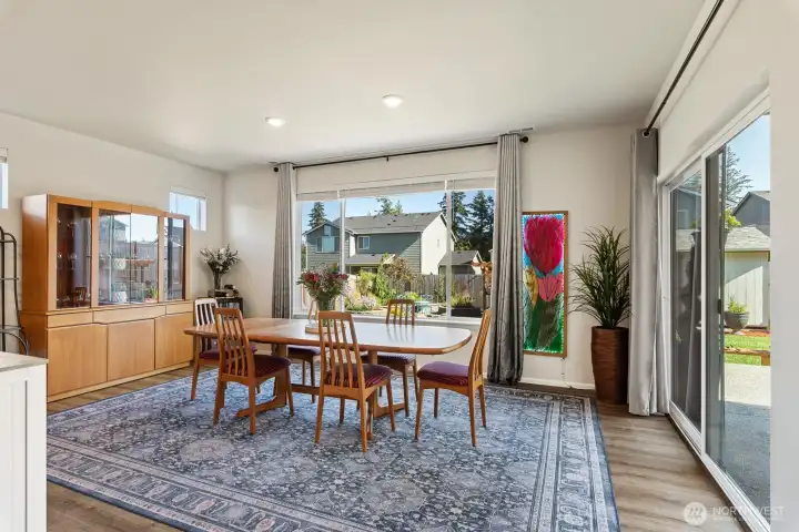 Dining area with beautiful backyard views.