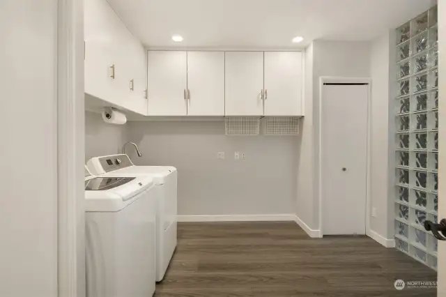 The laundry room is spacious and off the main living area.