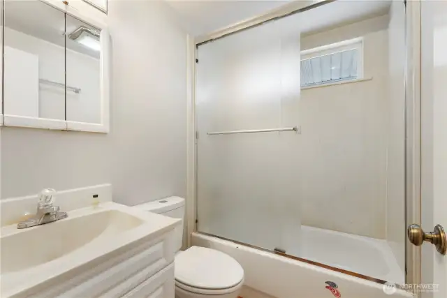 Full bath with high efficiency toilet.