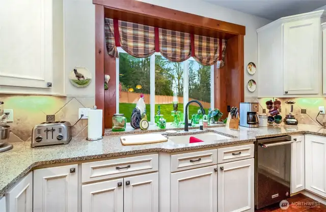 Crisp~Clean~White Cabinetry~Smooth Slab Granite Counters~Undermount Oversized Sink Basin~Tile Backsplash & Task Lighting~