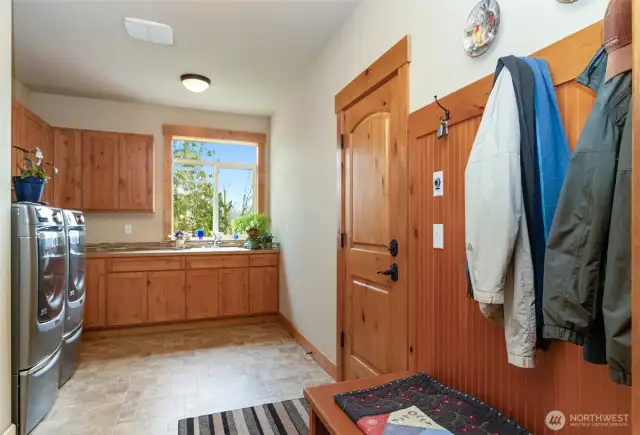 Spacious Laundry/Mud Room~Bead Board Accents~Foldind Table~Utility Sink~Room for Drying Rack & Ironing Board~HE Washer & Dryer on Pedastals DO NOT CONVEY...Nor does the Garage Freezer.