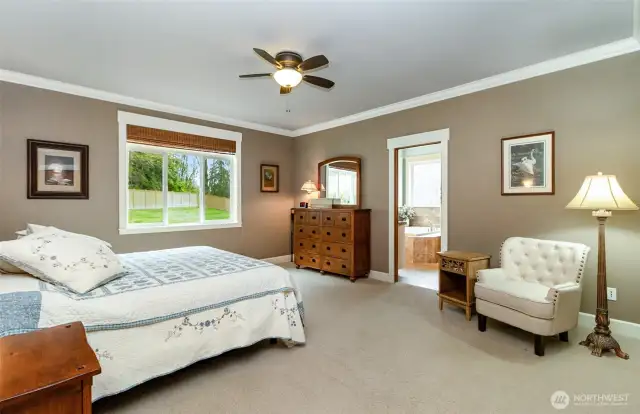 Primary Suite Space Allows for a Sitting Area~Overlooks the Back Lawn~Attached 5 Piece En*Suite~