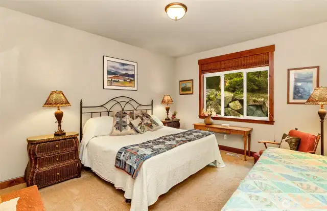 Secondary Bedroom Faces the Back Lawn & Rockery~