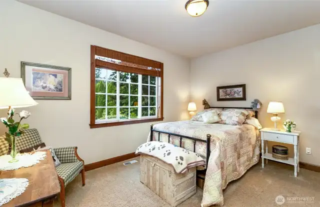Front Facing Secondary Bedroom~HUGE Closets~Shared Bathroom~Opposite end of the Home from the Primary Suite~Both Secondary Bedrooms have Walk in Closets~