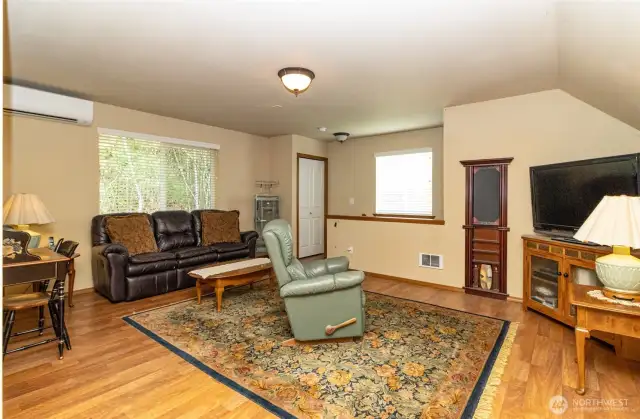 Alternate View~Apartment Above the Detached Garage~Electric Wall Heaters~Mini Split A/C~668 sq feet~1 Bed & 1 Bath~Step Saver Full Kitchen Overlooks the Front of the Property~New Fridge & New Hot Water Tank~