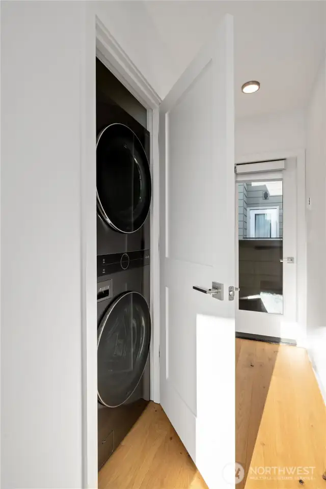 Laundry closet in upper level hallway.