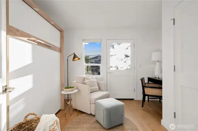 Entry level bed/flex room with wall bed. An ideal guest room or home office. There's also access to the private patio space.