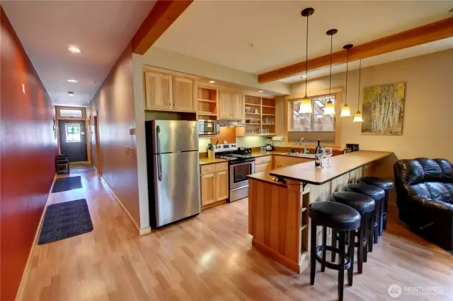 All appliances included with the sale of unit 101.  A hallways connects your great room to your bedroom w/ ensuite bathroom and private half bath with stacked washer and dryer.