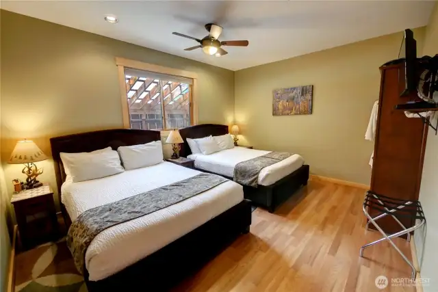 Robes, hot tub towels, complimentary slippers, and an in room TV are all part of your guests amenities.