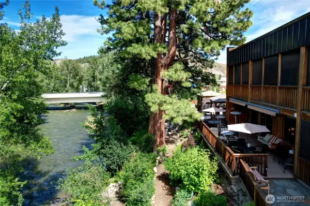 Umbrellas for big sun, heaters for fringe seasons, lots of spaces for guests to lounge in nature, feel somewhat private, and experience relaxation.  No matter what their mobility level may be.