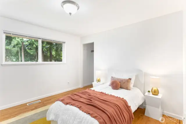 One of the three main floor bedrooms!