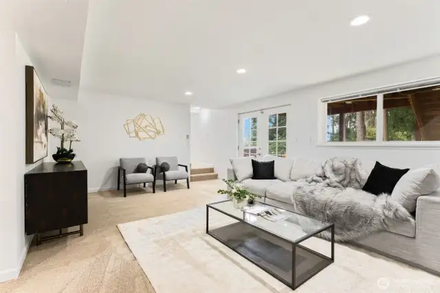 This is the large downstairs rec room. It is a perfect place to watch a movie or have a game night!