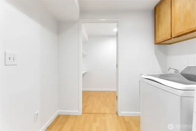 This is the laundry area downstairs. It also has tons of storage area down here.