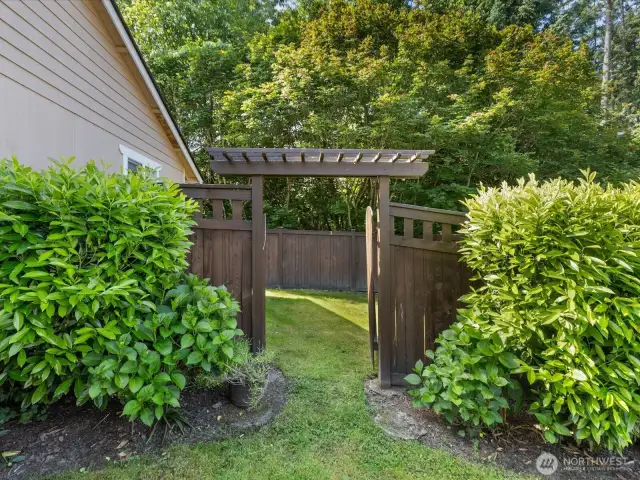 Right side of the house leading to private back yard
