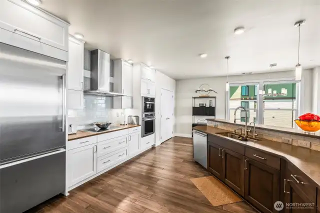 You'll love the upgraded cabinets and Thermador Appliances