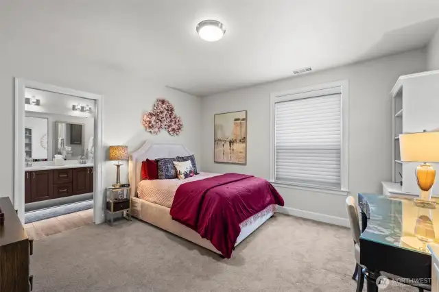 Guest room or junior primary with private bath and walk in closet.