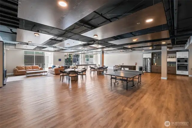 This space has a view deck off...two kitchenettes and a divider so two parties can happen at the same to=ime.  There ping pong and shuffle board  in addition to two tvs too.