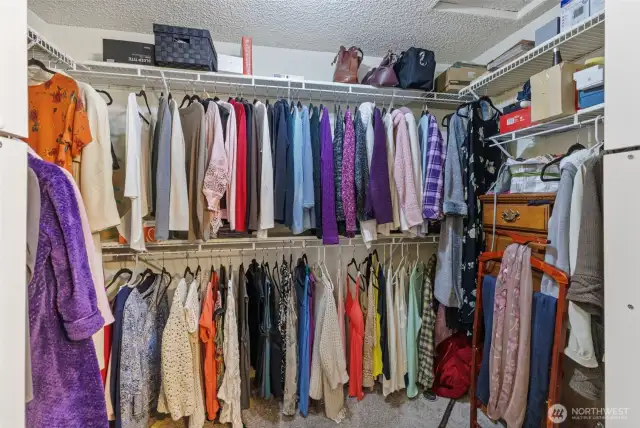 Huge walk in closet with cubbies