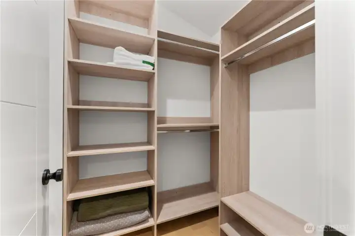 Primary walk-in closet.