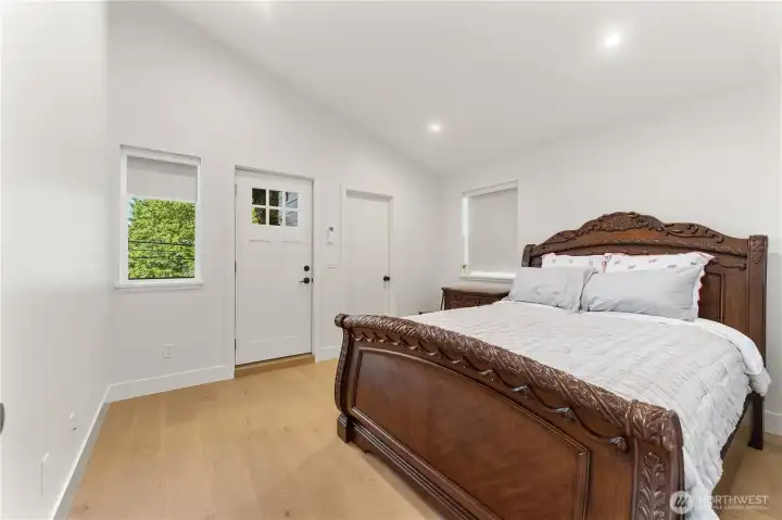 Upstairs bedroom #3. Balcony door to the left, closet to the right.