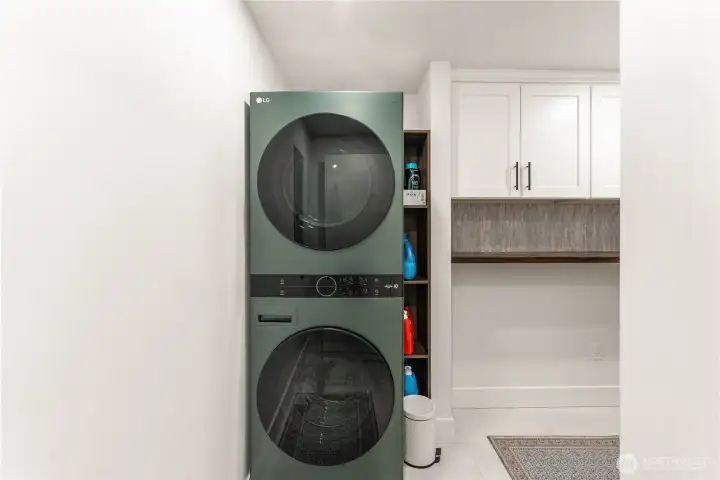 Well thought out utility room on the lower level. Heated tile floors down here.