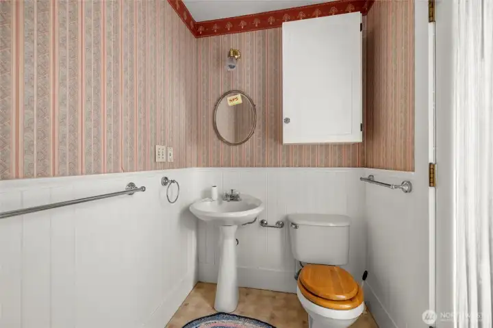 Bedroom 1 with half bath and garden window