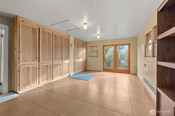 Bonus room with loads of storage and doors to outdooe deck