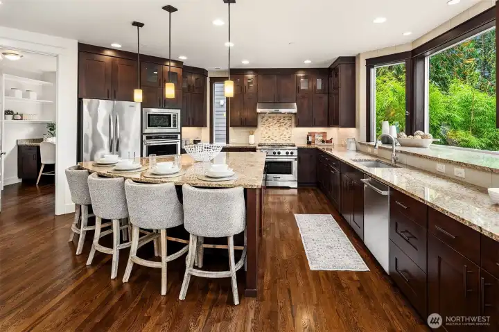Huge chef's kitchen with double oven and plenty of counterspace.