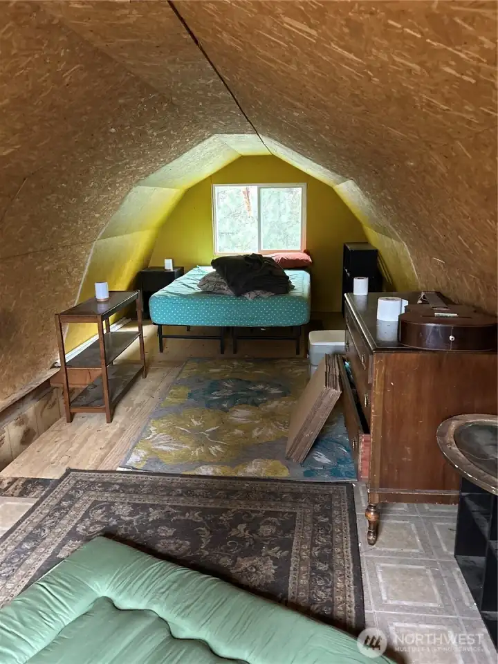 Loft bedroom in main cabin.