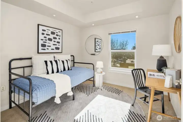 The second bedroom or office space also includes a large closet.