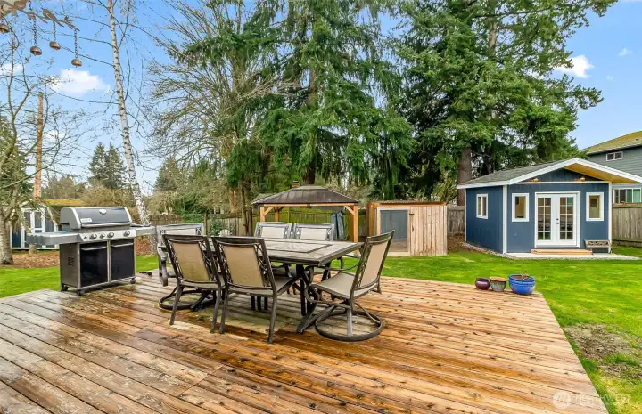 Backyard Deck with view of hot tub and WFH Shed