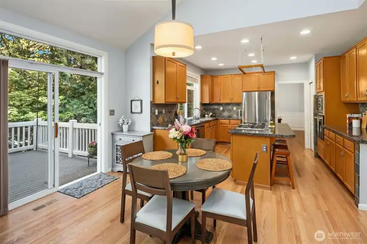 Additional eating area with sliding doors leading to deck