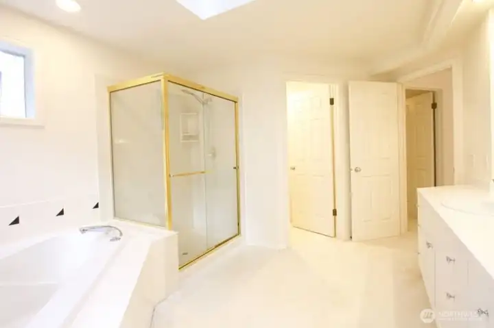 Primary Suite Bathroom and Soaking Tub