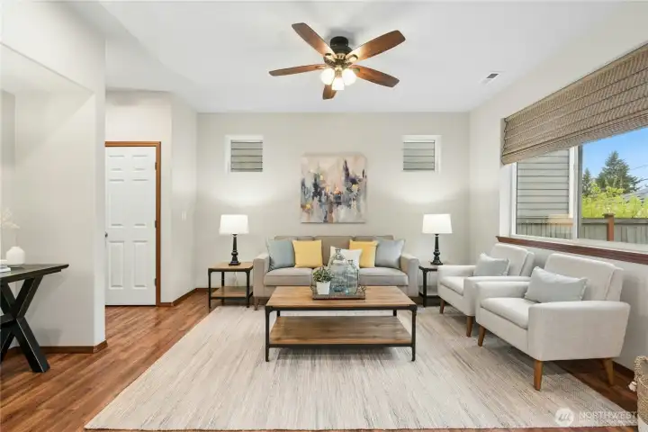 Entertain your favorite people in the open living area with gas fireplace.