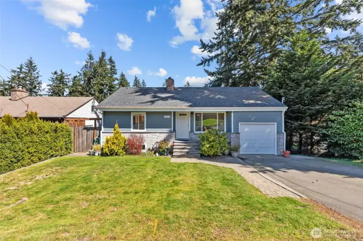At first glance this looks like an adorable little cottage. Wait until you see inside! Open living space upstairs with huge living area downstairs as well. 4 bedrooms! Great floorplan. And don't forget to check out the yard!