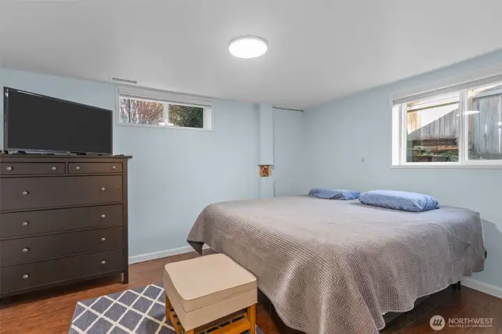 This is the 4thad largest bedroom, located downstairs at the end of the hallway.