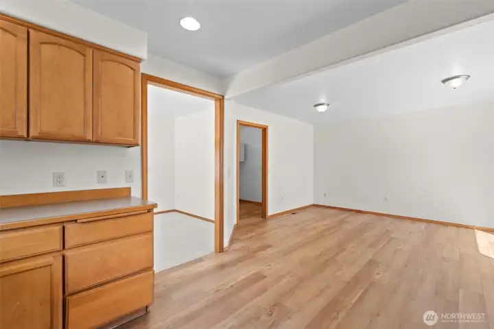Kitchen to family room has plenty of room for another eating area.