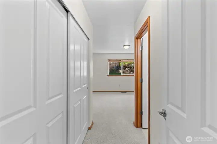 To primary bedroom with double door closet