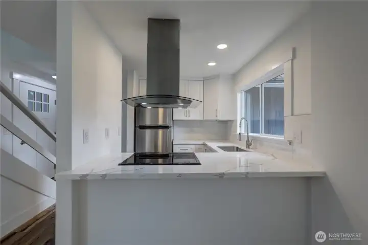 Contemporary kitchen showcasing upscale finishes and an open, inviting design.