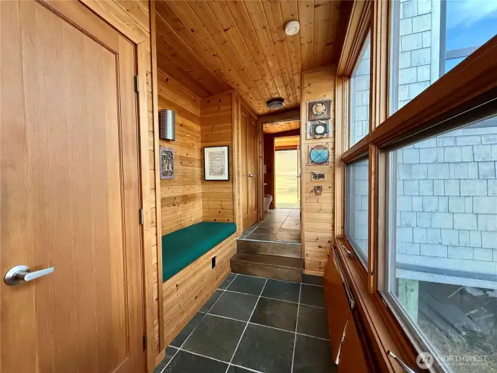 Hall to bathroom and primary bedroom from kitchen/mail living area. Hall to bathroom and primary bedroom from kitchen/mail living area.