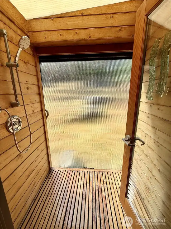Shower with door which opens to the outside. Shower with door which opens to the outside.